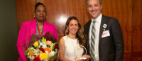 Maletz (center) receiving award from two colleagues